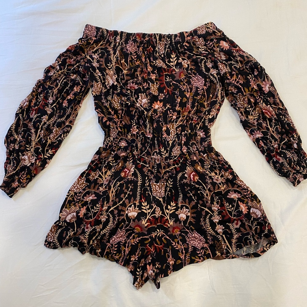 Free people romper with open back